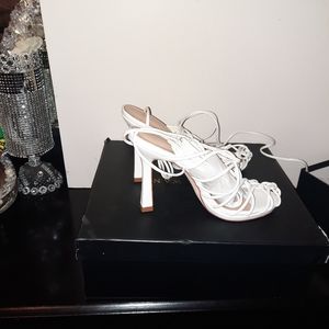 A white strap up slippers